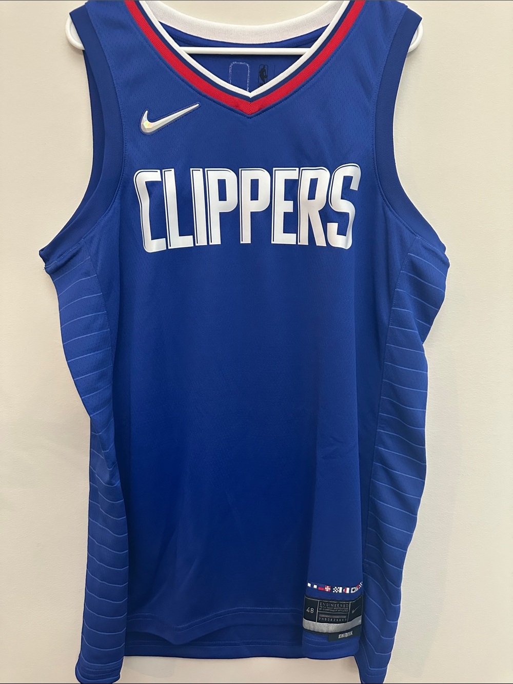 Nike Blue Clippers Basketball Jersey with Red and White Trim